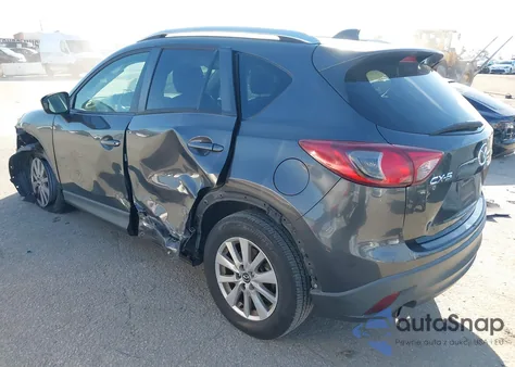 2014 Mazda Cx-5 Touring z USA, uszkodzony, nr VIN JM3KE2CY5E0332991